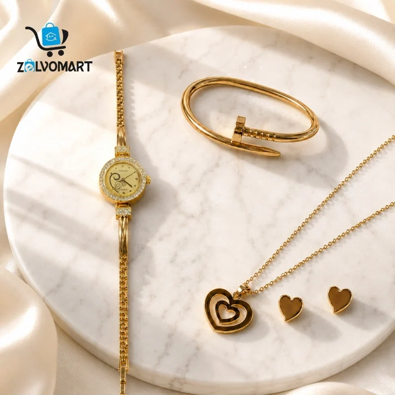 Watch, bracelet and heart pendant necklace set laid flat